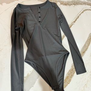 Gunmetal gray bodysuit. Never worn.